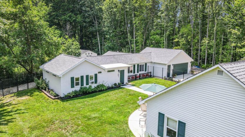 country home on 4 acres with private lake frontage Michigan